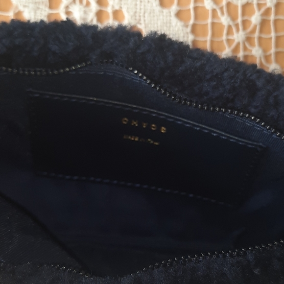 Chaos
Domino Shearling Mini Purse Charm - Picture 3 of 4